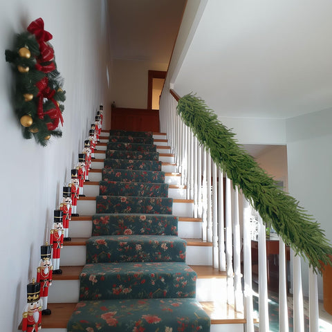 IPOOLTENG garland on covered porch enhancing entryway curb appeal and seasonal charm