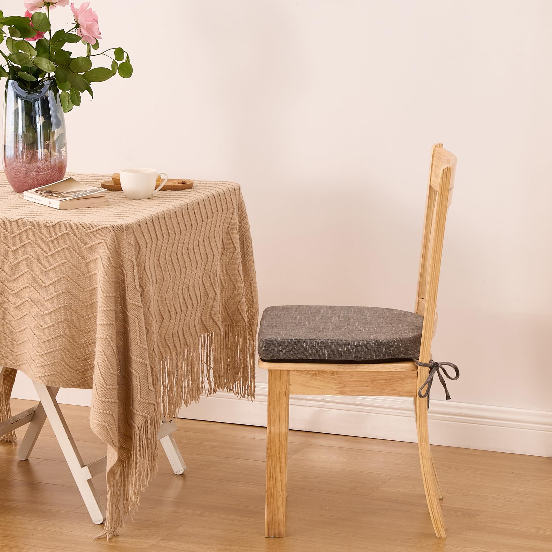 IPYNBAP cushions styled at kitchen table highlighting neutral look and practicality