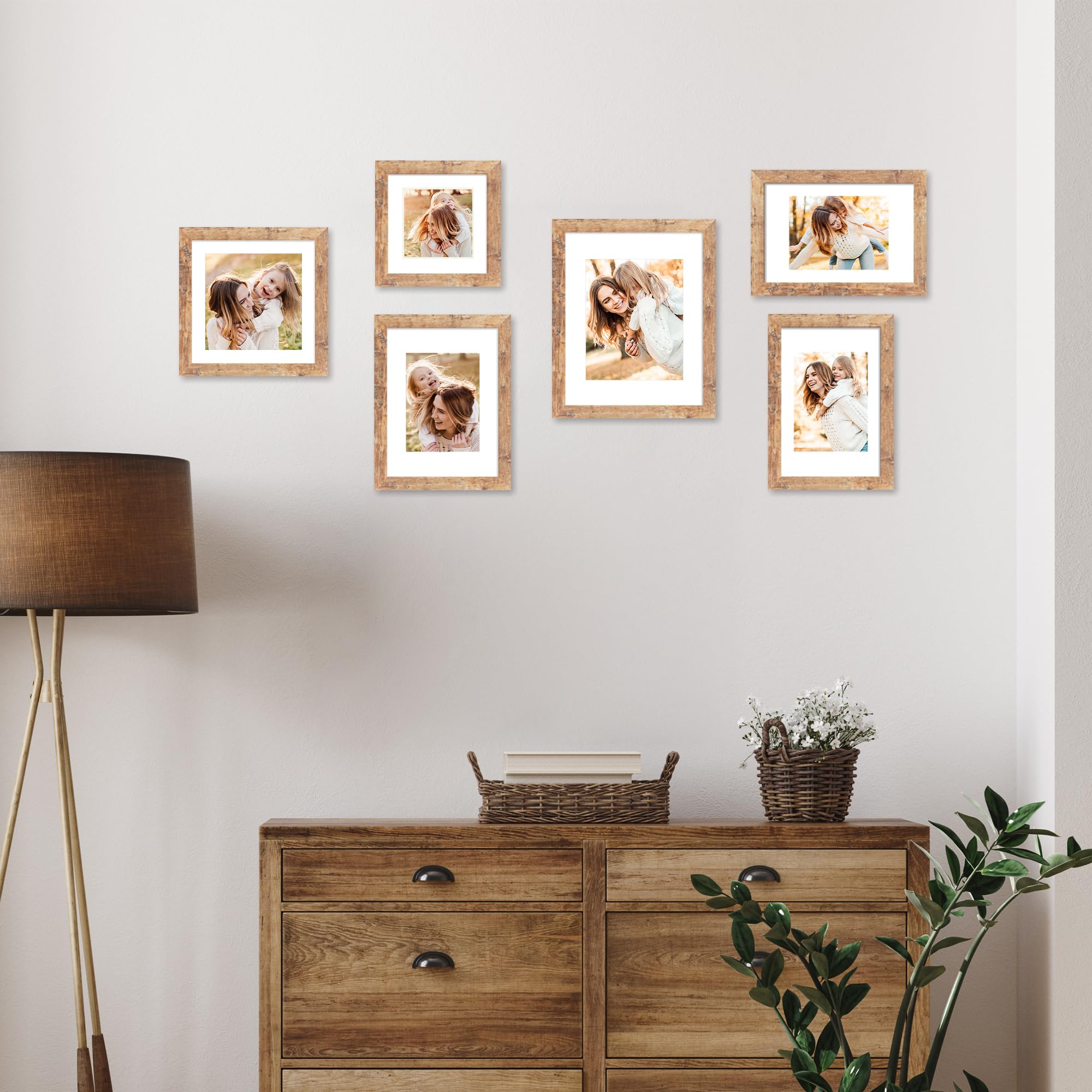 iRahmen framed photos arranged on wall showing cohesive gallery impact