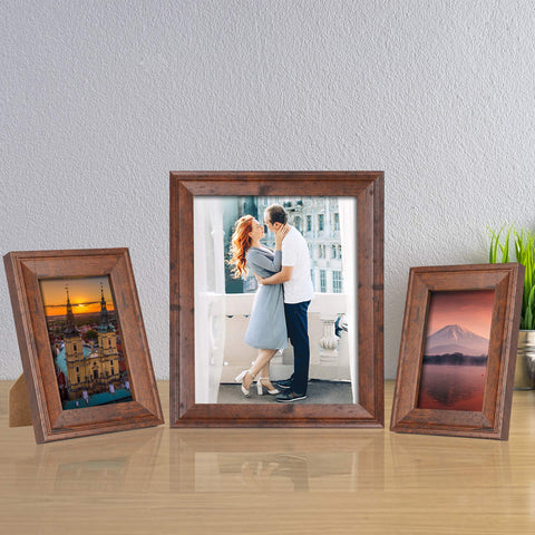 iRahmen frames styled on living room wall and shelf showing coordinated gallery impact