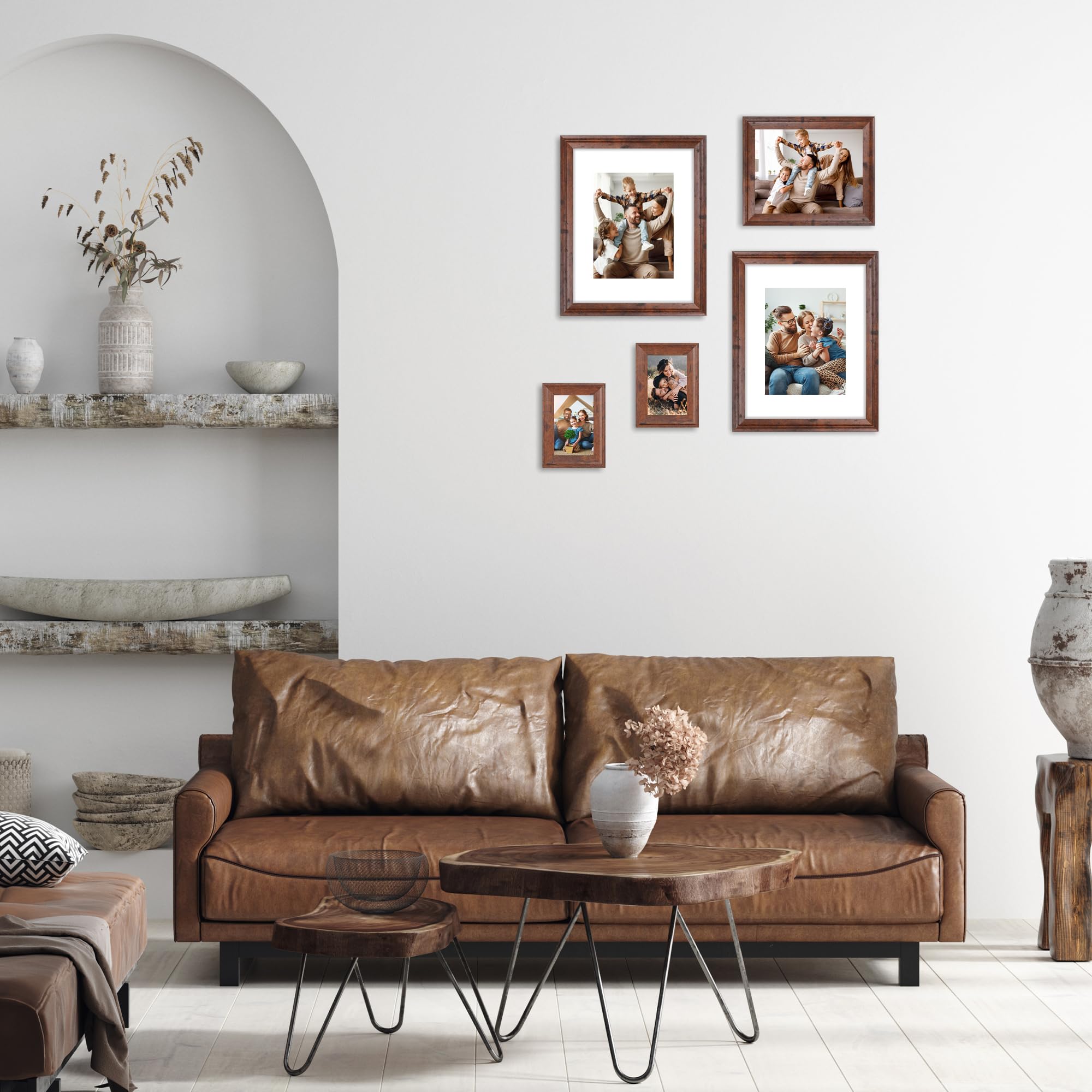 iRahmen frame held by hand showing scale and lightweight convenience for hanging or tabletop use