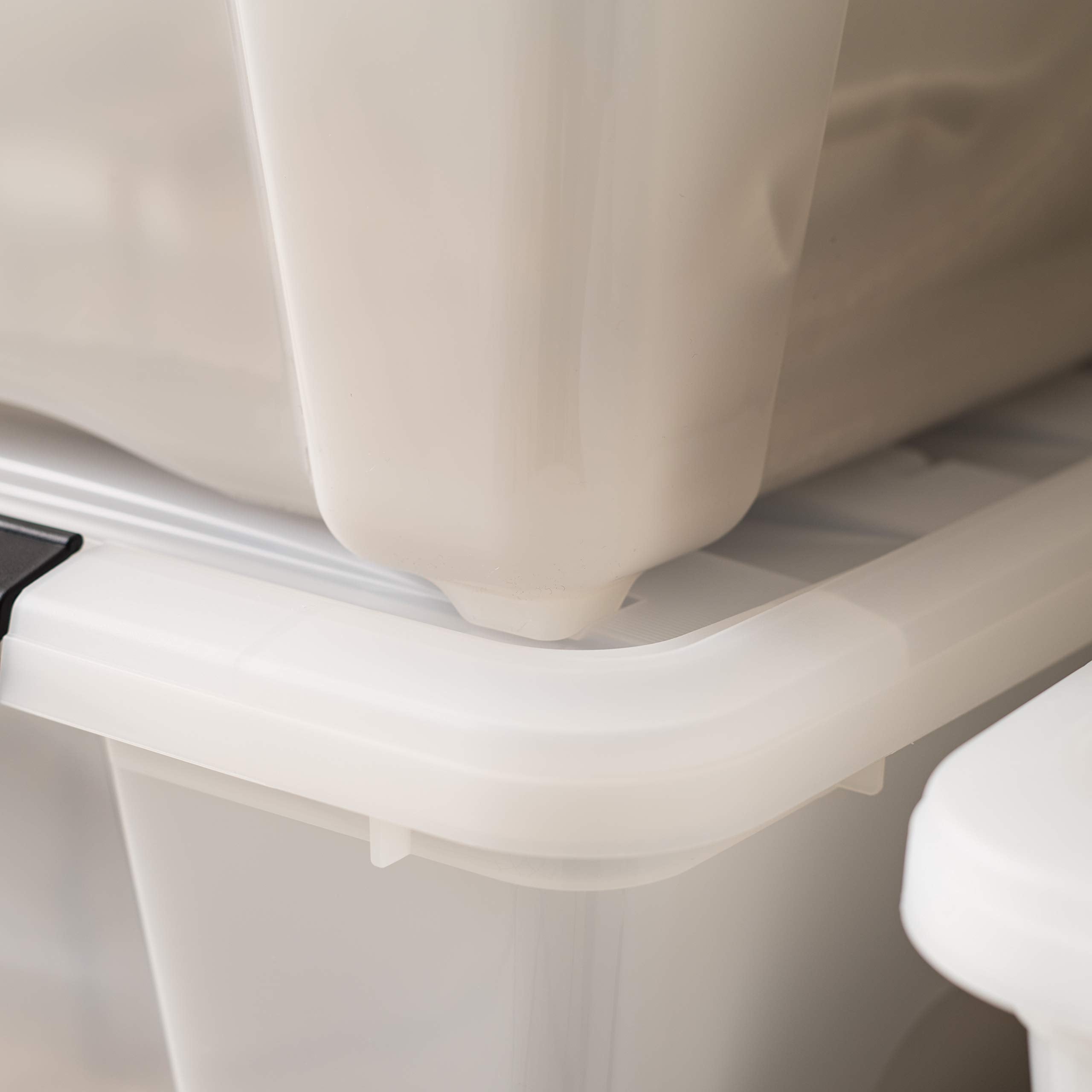 IRIS USA bin next to a chair for scale and size-reference convenience