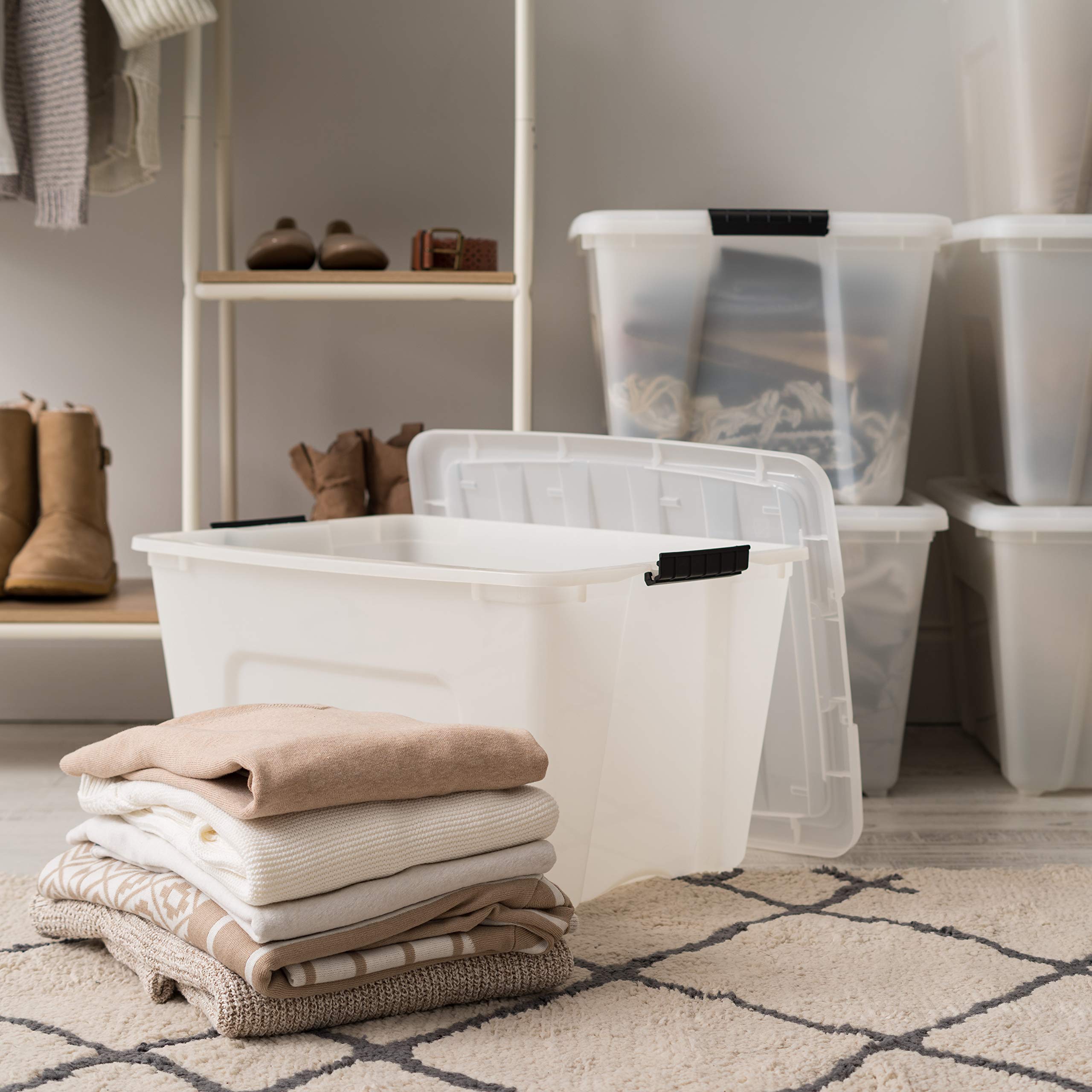 IRIS USA bins stacked on shelving to maximize vertical storage space