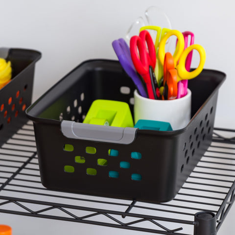 IRIS USA basket on desk containing pens and chargers for tidy workspace