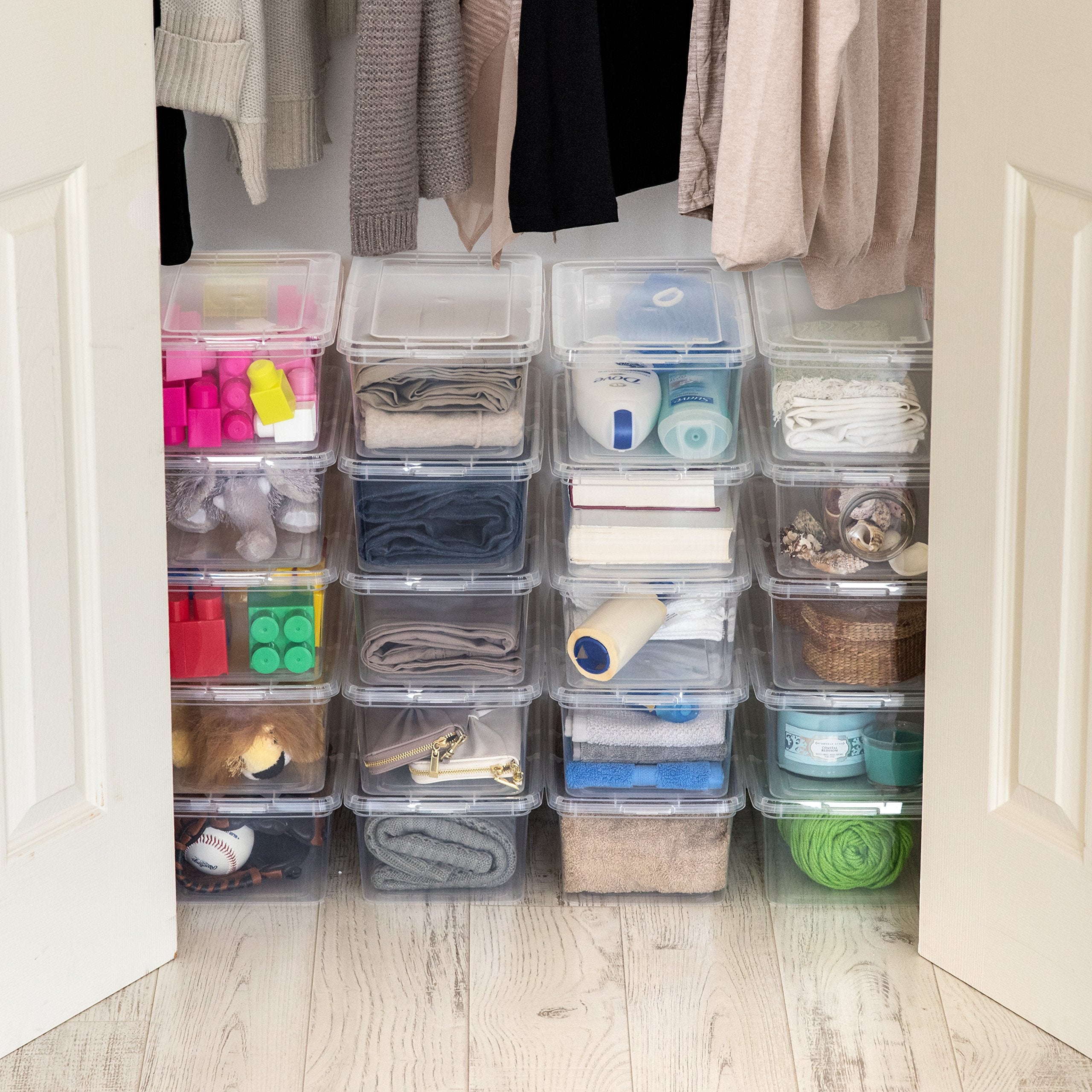 IRIS USA bin held in hand showing compact scale and portability