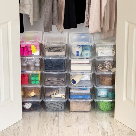 IRIS USA bin held in hand showing compact scale and portability