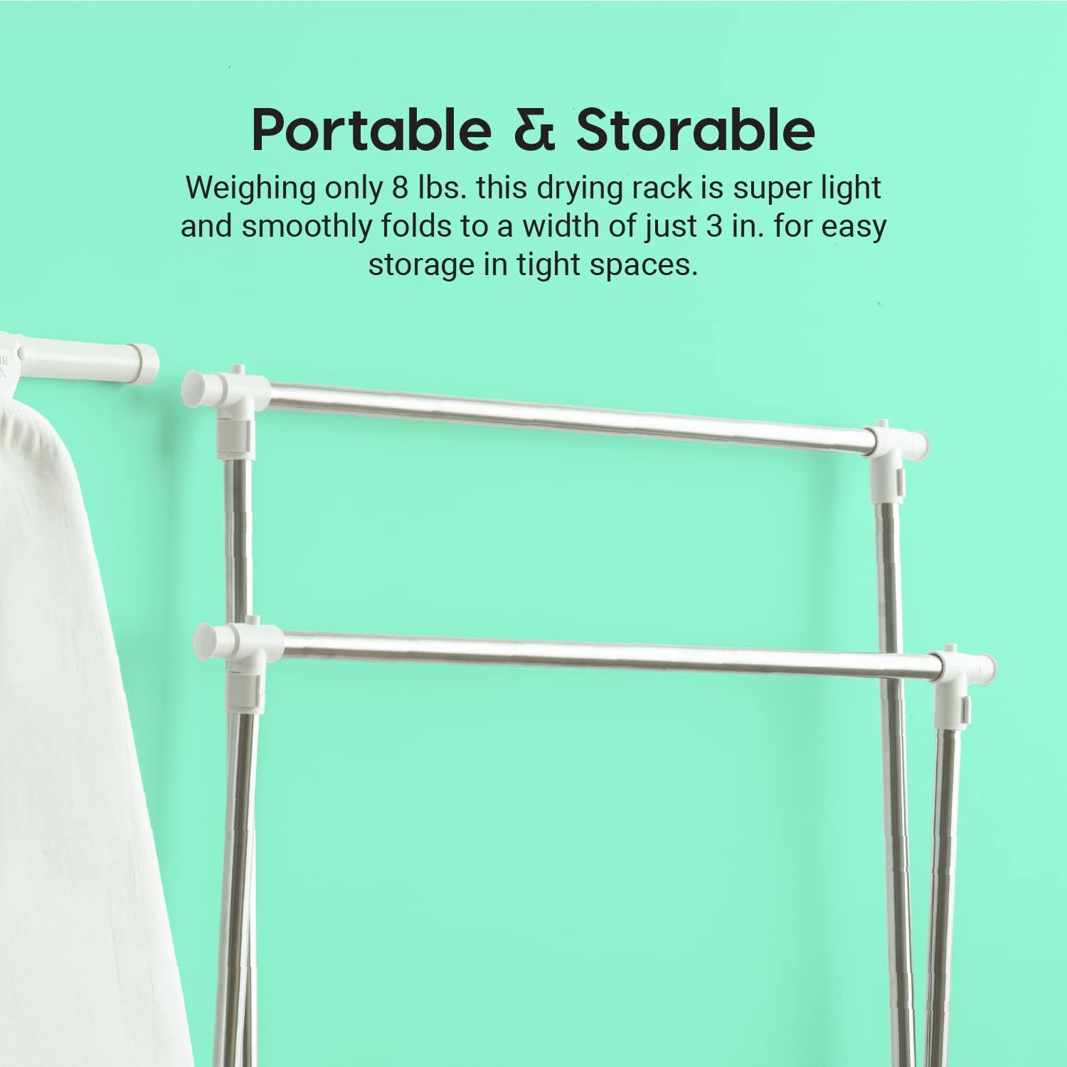 IRIS USA drying rack next to a chair showing scale and household fit