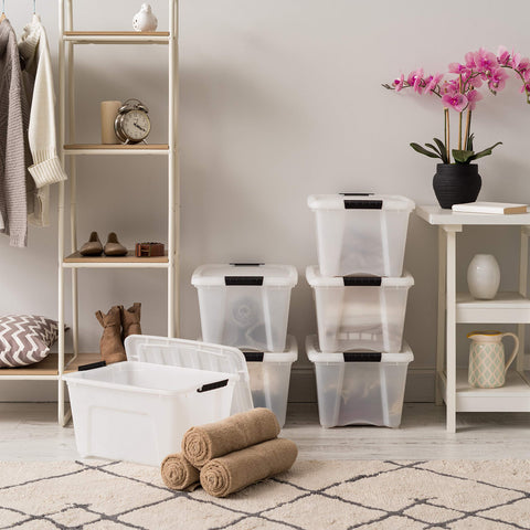 IRIS USA built‑in handle being pulled to slide bin from a shelf easily