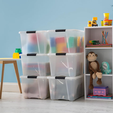 IRIS USA bin opened displaying shoes and folded clothes for easy visibility
