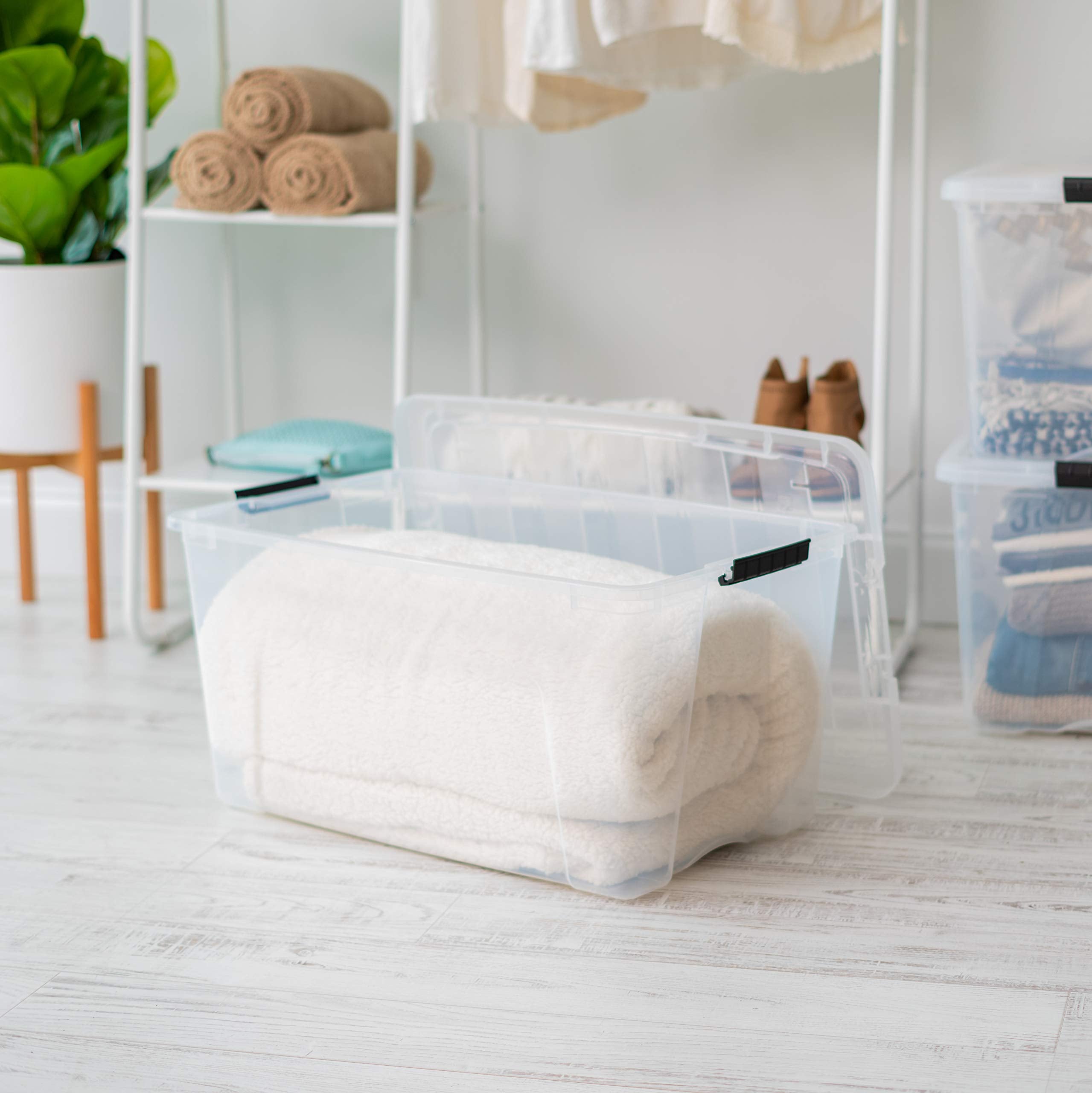 IRIS USA bins organizing a closet creating tidy, accessible seasonal storage
