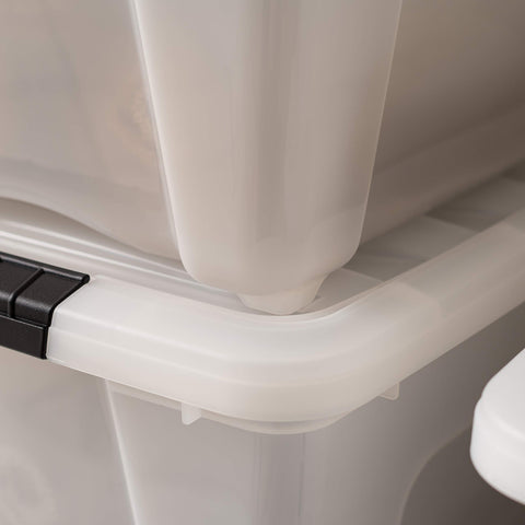 IRIS USA bins organized in a closet showing tidy, discreet storage solution