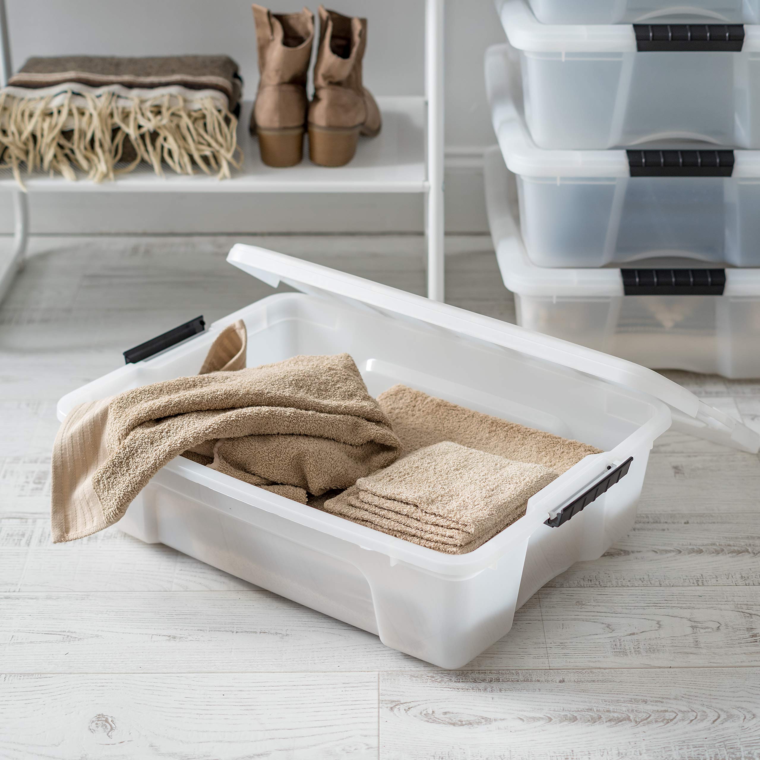 IRIS USA bins stored under bed demonstrating organized use