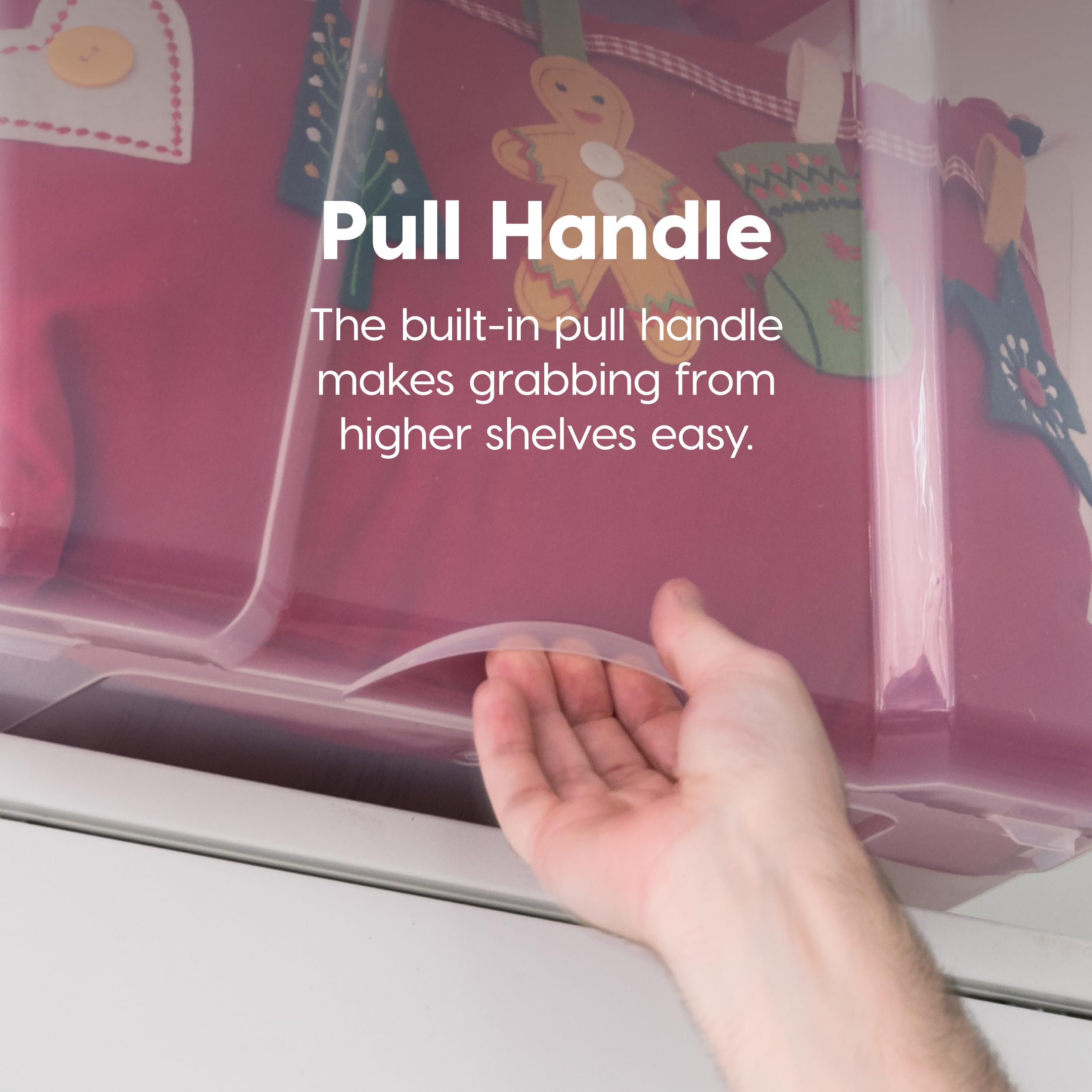 IRIS USA pull handle being used to slide bin from high shelf for easier access