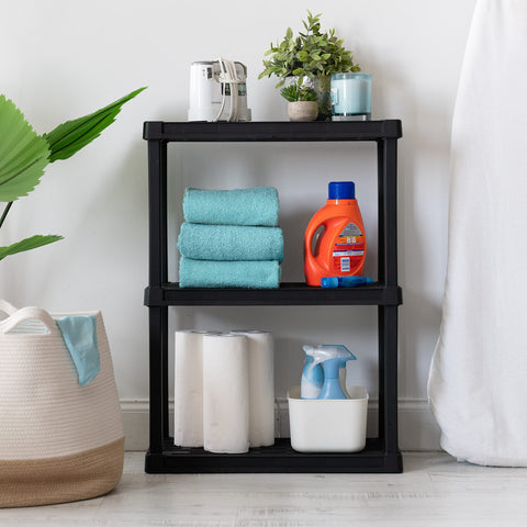 IRIS USA shelf in garage storing small tools and utility items neatly