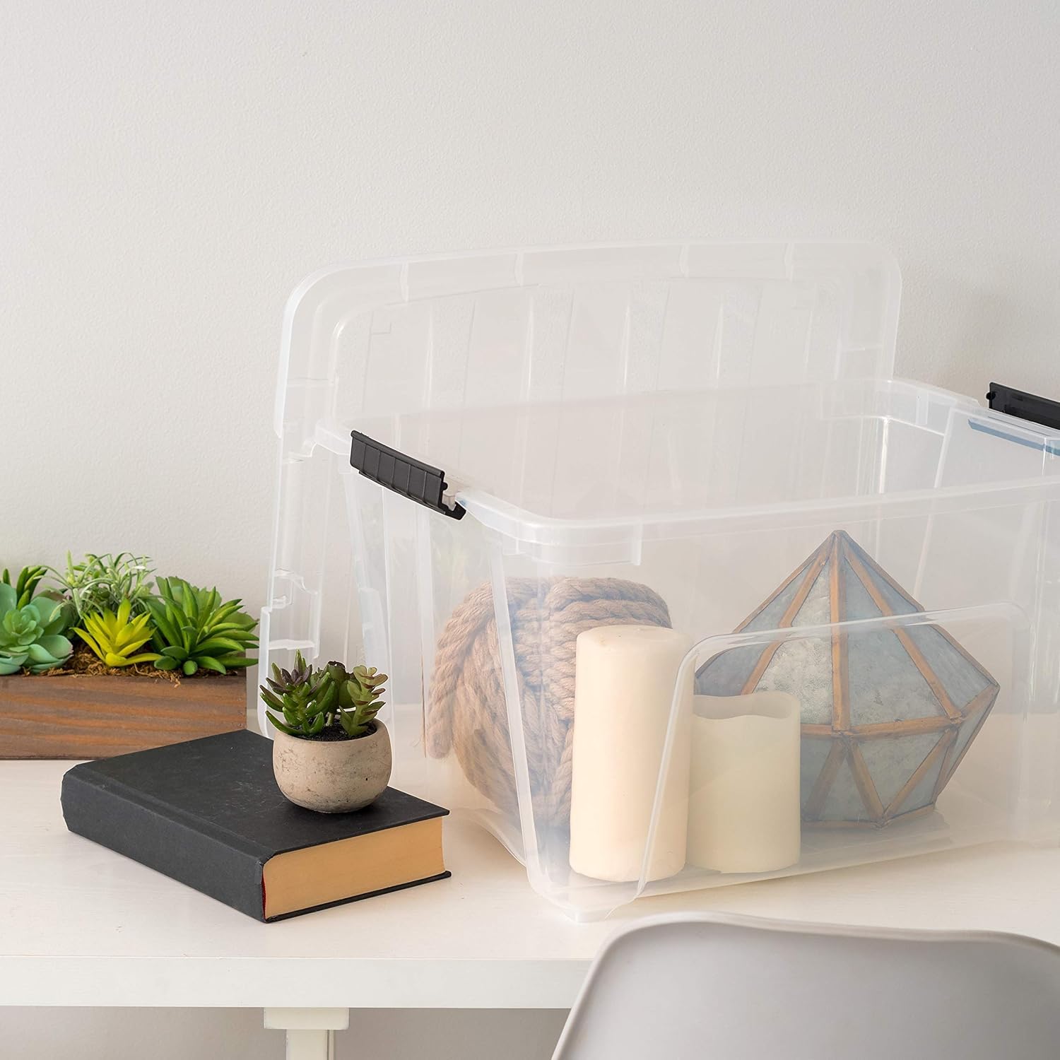 IRIS USA clear bin filled with shoes showcasing visible, dust-free storage
