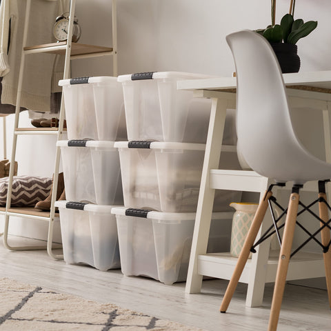 IRIS USA bin next to shoe illustrating 32‑quart size and practical scale