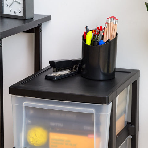 IRIS USA organizer next to tape measure illustrating compact dimensions and narrow fit