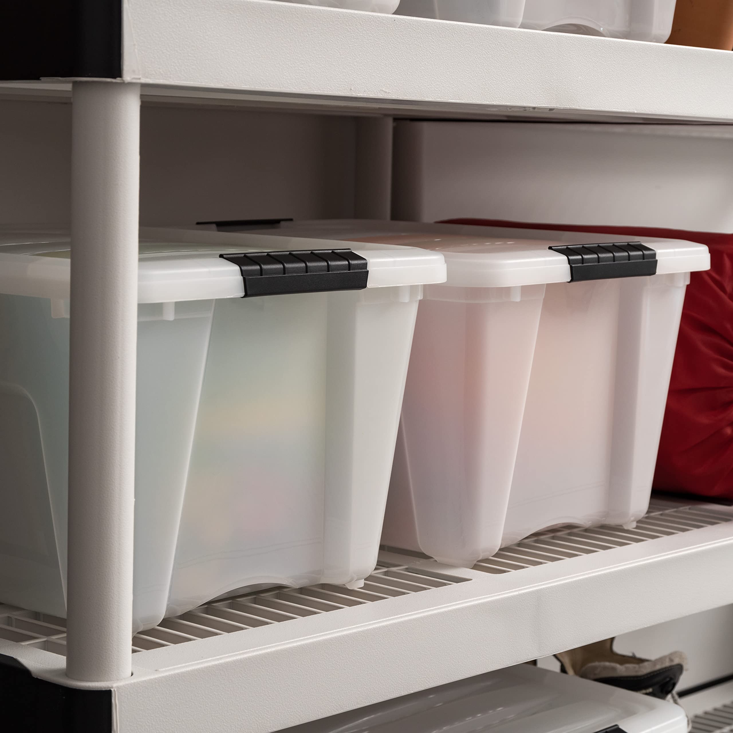 IRIS USA stacked bins in a closet maximizing vertical space