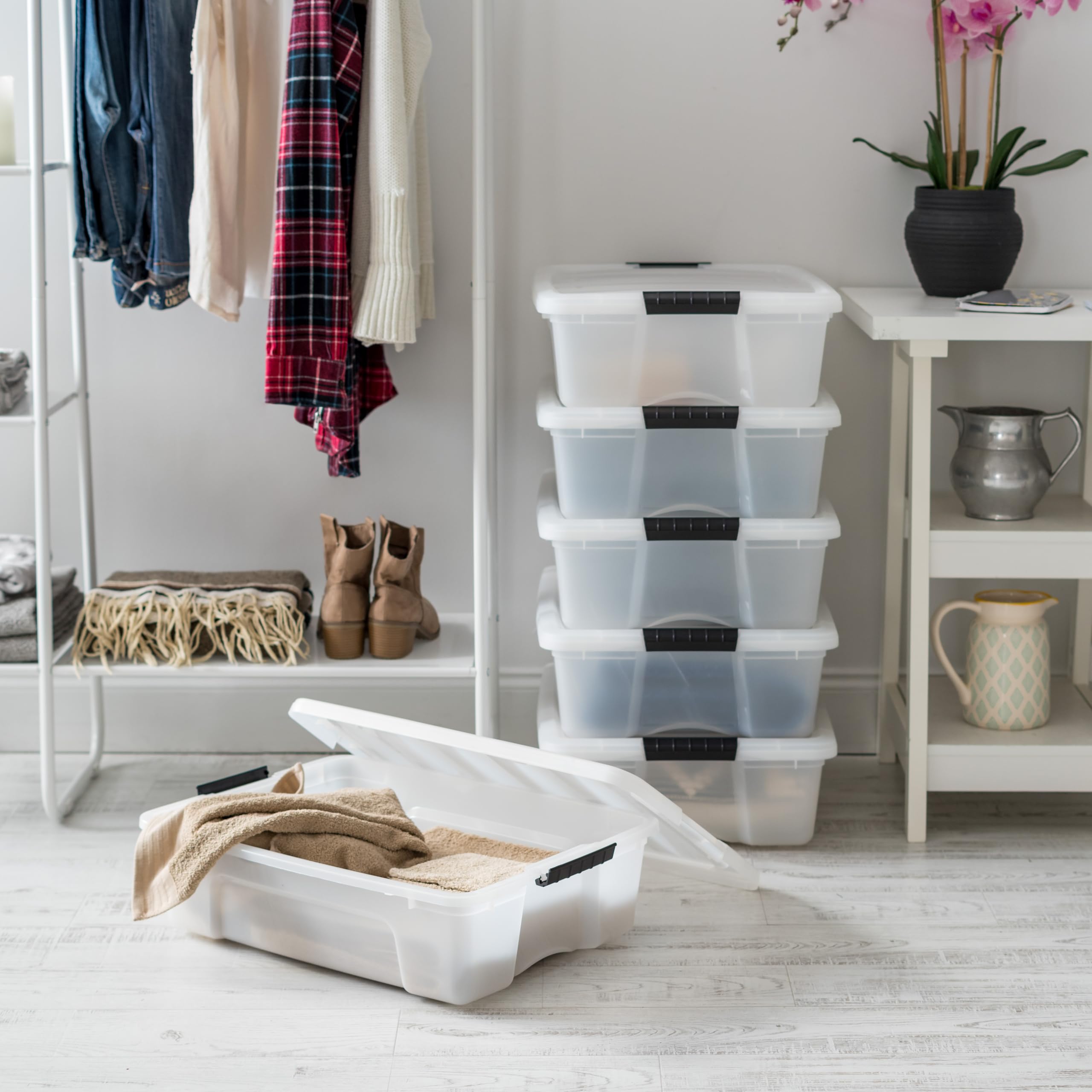 IRIS USA stacked bins in a closet maximizing vertical storage