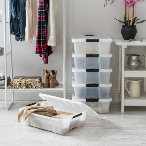 IRIS USA stacked bins in a closet maximizing vertical storage
