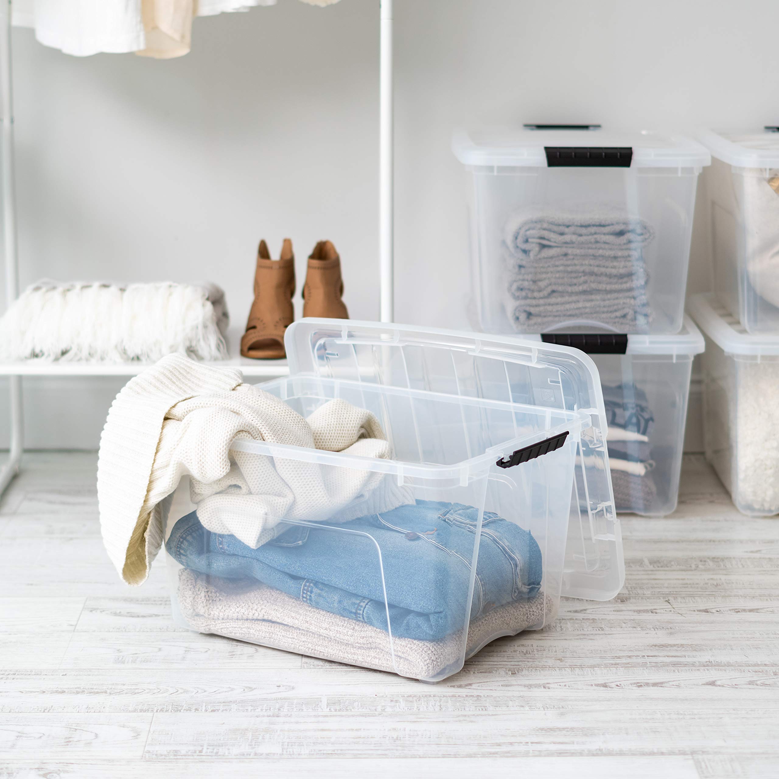 IRIS USA stacked bins in closet maximizing vertical storage efficiency