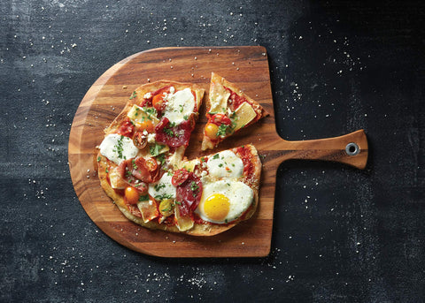 Ironwood Gourmet slanted edge closeup demonstrating easy pizza sliding benefit