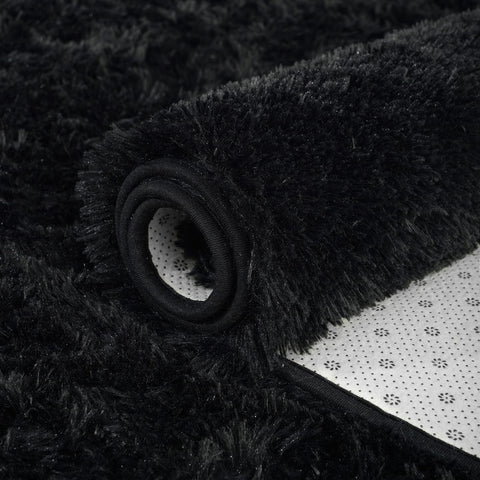ISEAU rug beside bed demonstrating soft landing and bedroom warmth