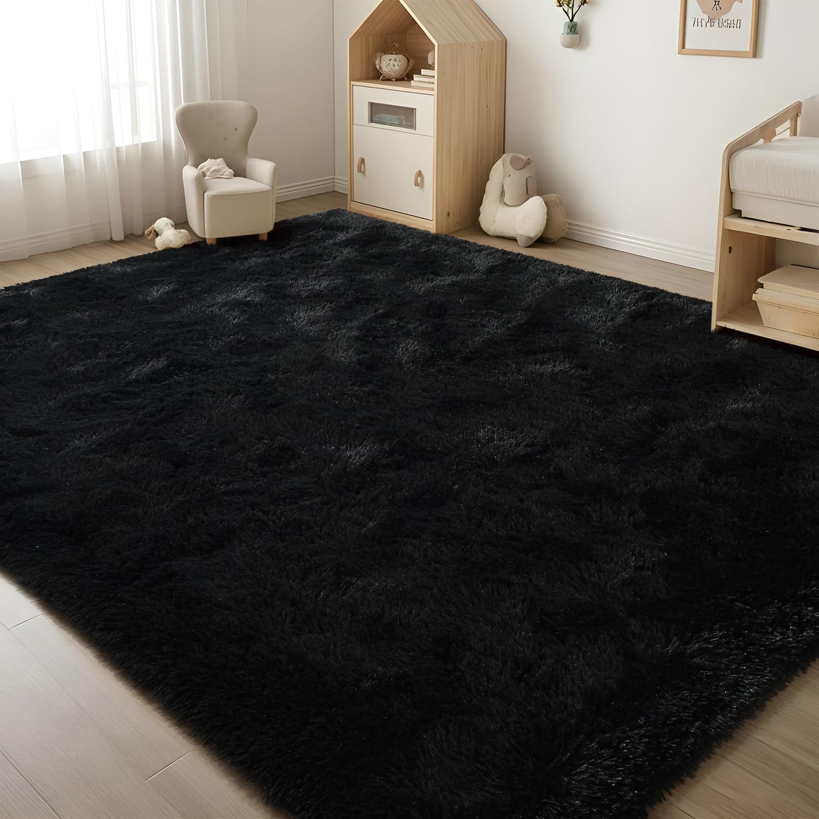 ISEAU rug next to chair for scale demonstrating generous 6x9 coverage