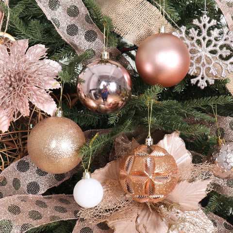 ISULIFE ornaments hanging on a decorated tree creating a polished holiday look