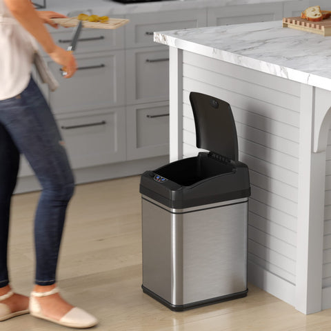 iTouchless size comparison with common objects showing compact 8 gal capacity benefit