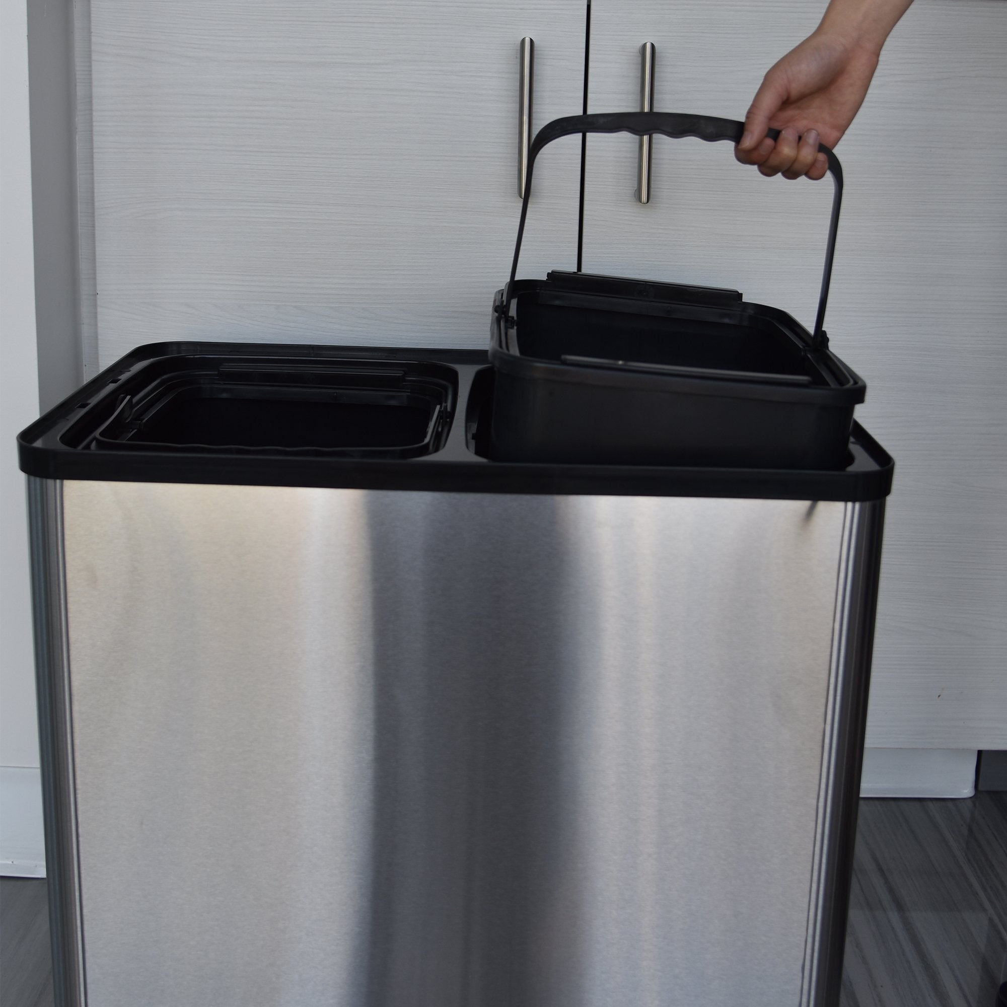 iTouchless beside cabinet showing compact size saving floor space