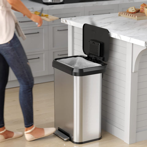 iTouchless side profile with lid open demonstrating smooth soft-close benefit
