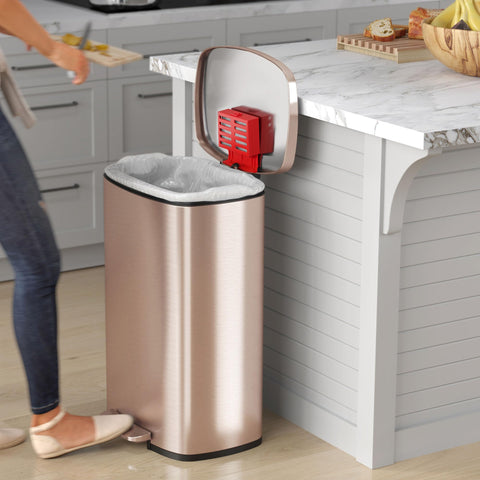 iTouchless pedal close-up showing durable stainless step for reliable hands-free use