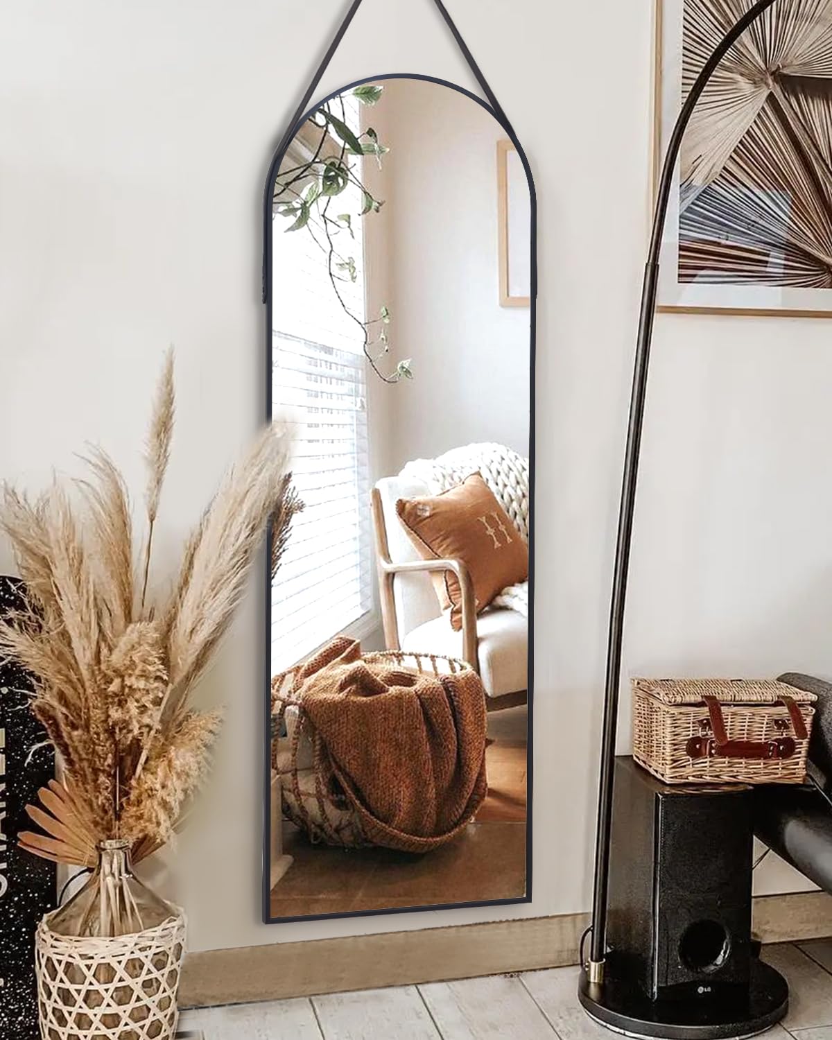 ITSRG front view showing arched full-length mirror and slim black frame, elegant reflection