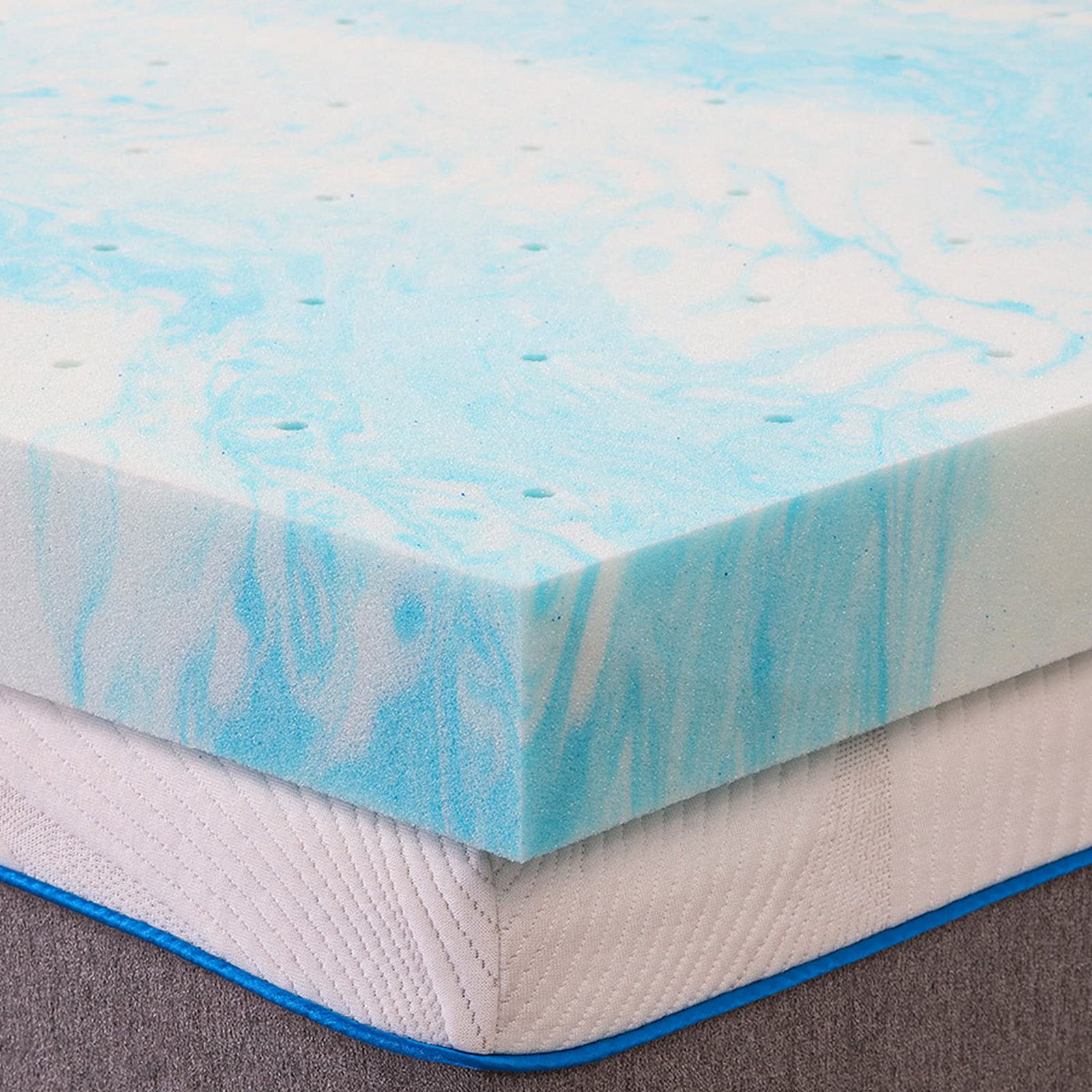 IULULU topper on bed in bedroom showing improved sleep comfort and style