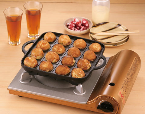 Iwatani pan at a party table showing social cooking convenience