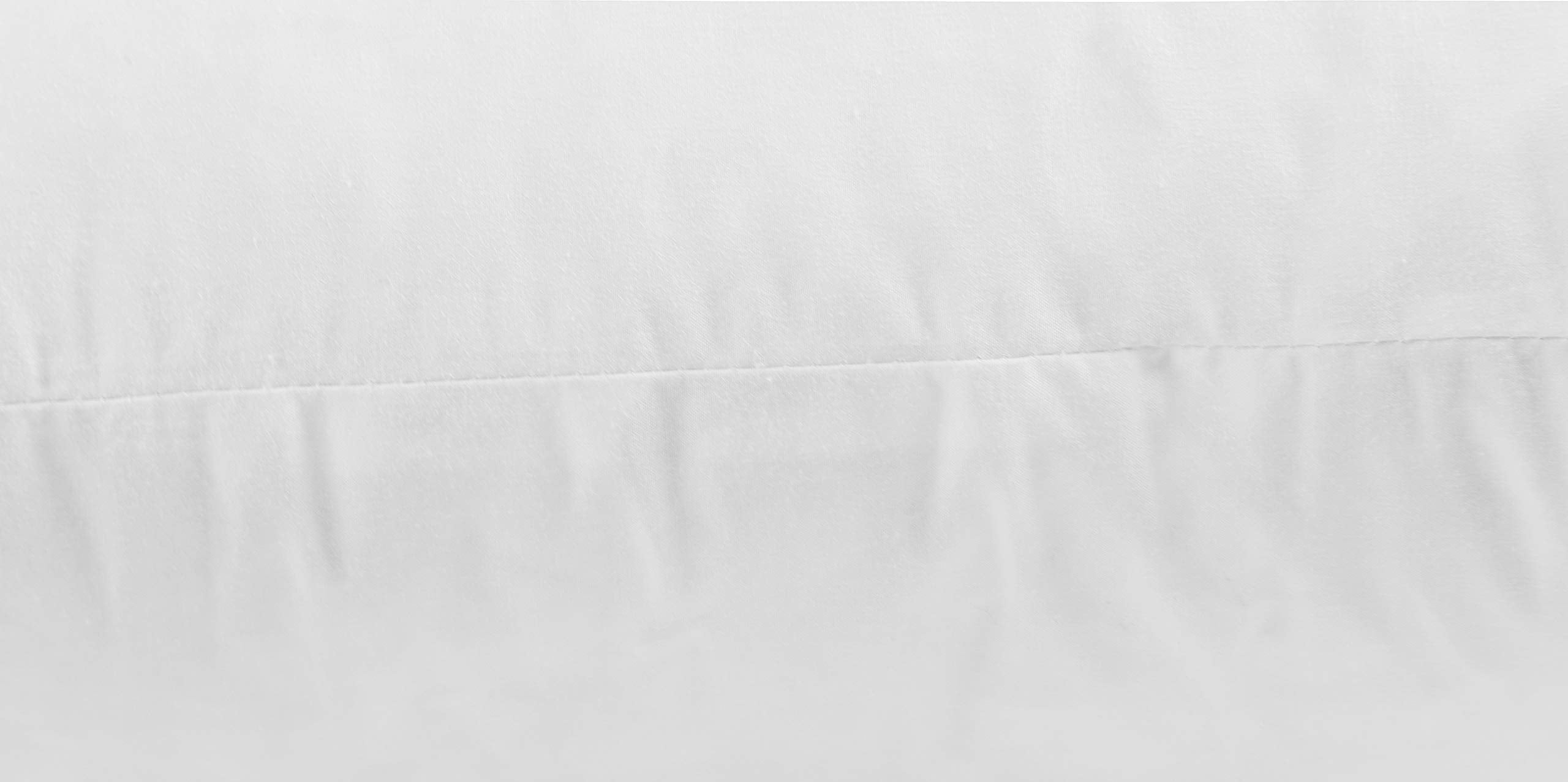 JA COMFORTS inserts styled on sofa creating layered decor and enhanced room comfort