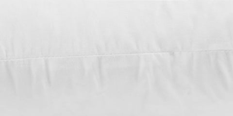 JA COMFORTS inserts styled on sofa creating layered decor and enhanced room comfort