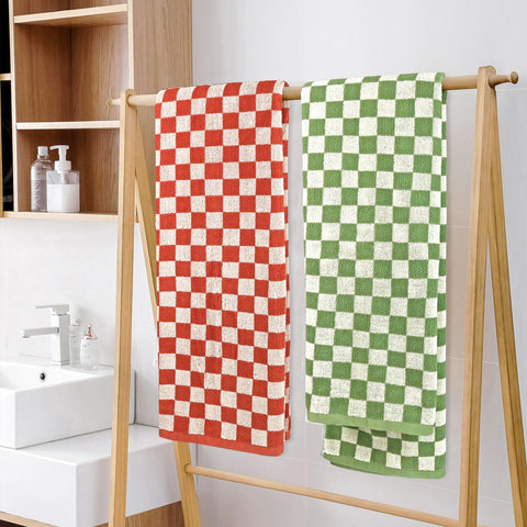 Jacquotha towels packed in suitcase demonstrating lightweight travel convenience