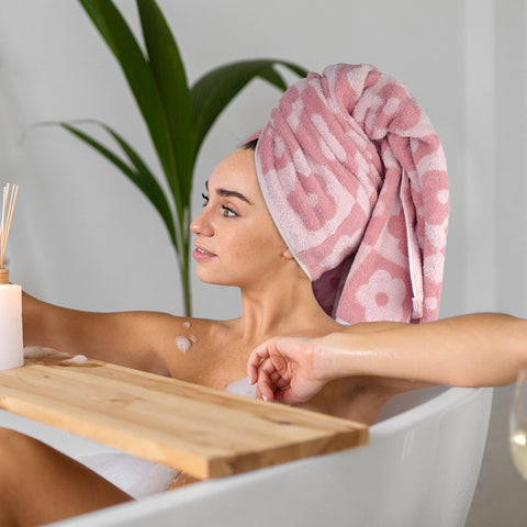 Jacquotha towel styled in bathroom scene showing decorative appeal and everyday use