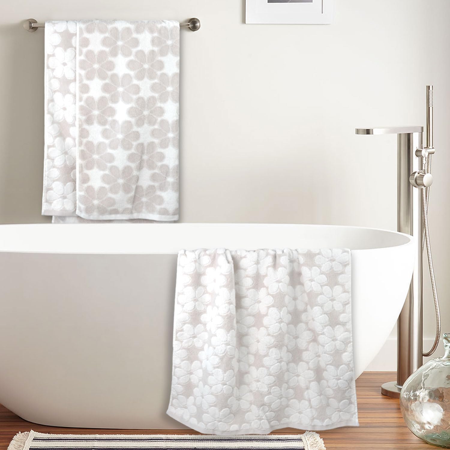 Jacquotha towel beside ruler illustrating 27.5 x 55 inches generous size