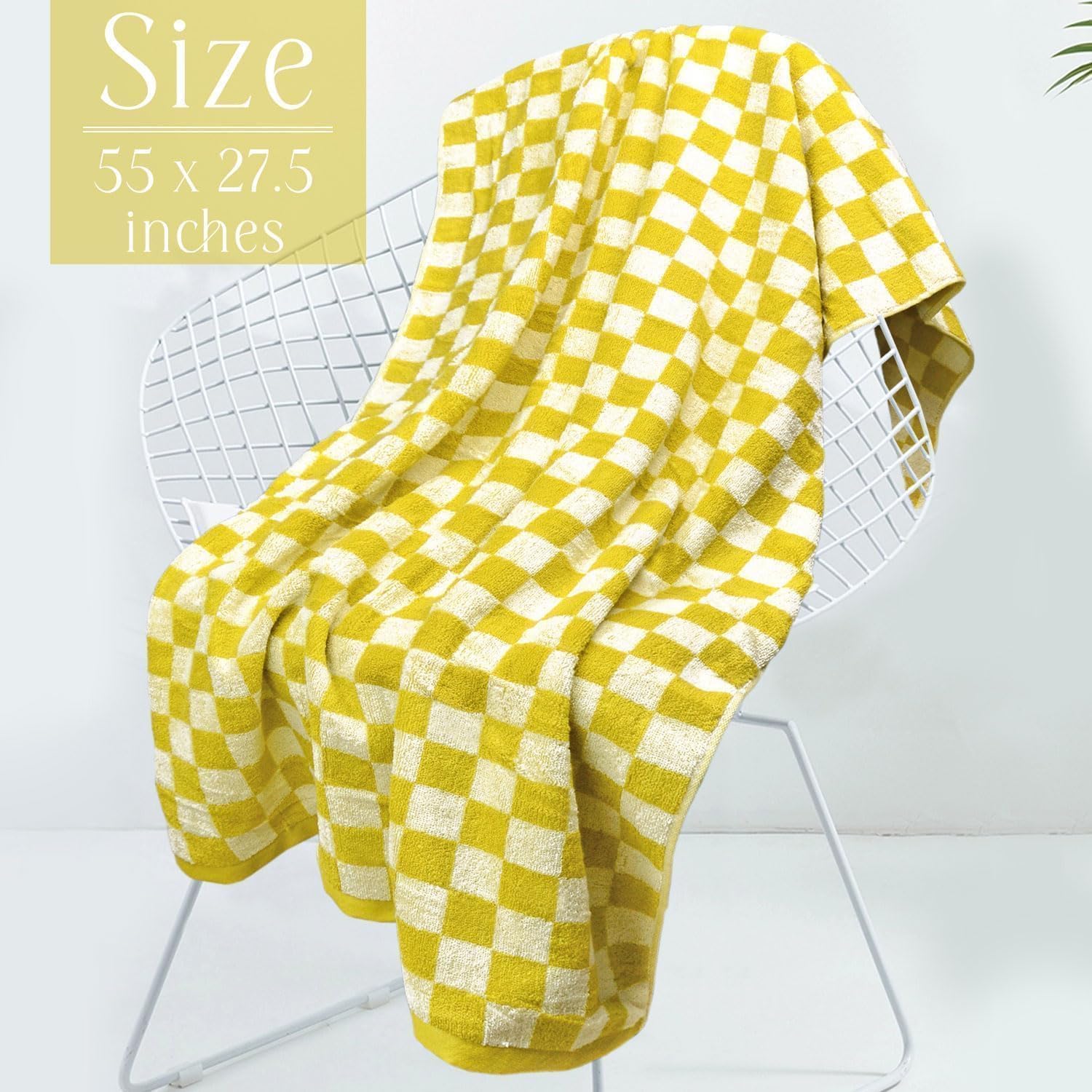 Jacquotha size comparison with book showing towel scale and portability