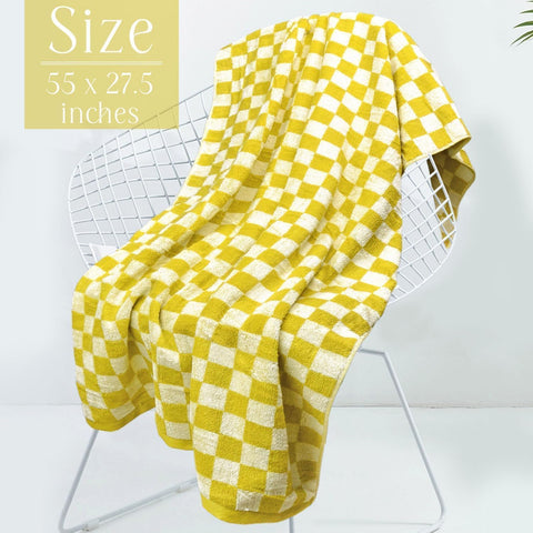 Jacquotha size comparison with book showing towel scale and portability