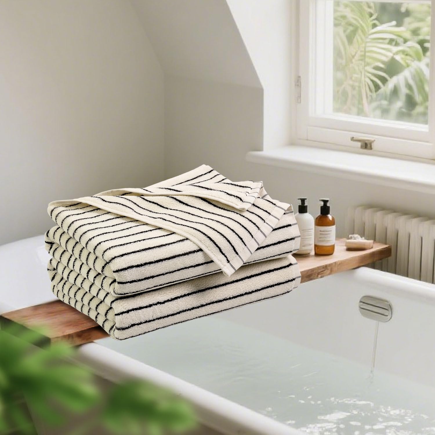 Jacquotha folded towel on shelf, neat storage and decorative appeal