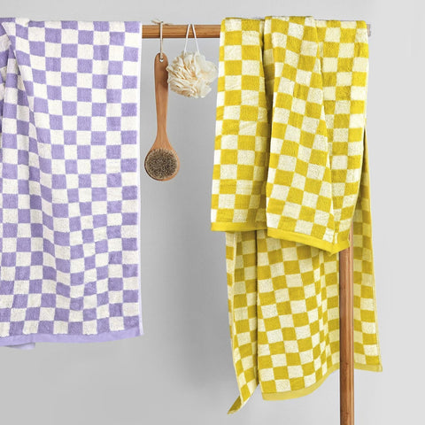 Jacquotha towel in use after shower demonstrating quick-dry convenience