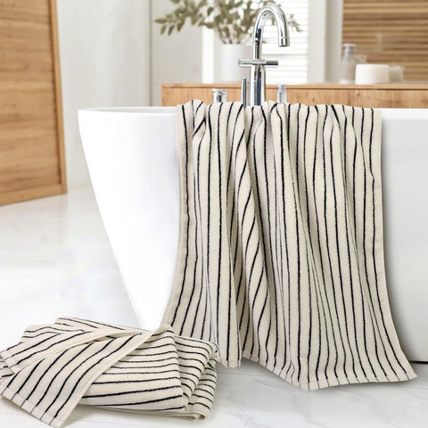 Jacquotha towel wrapped around person, quick-dry convenience after shower