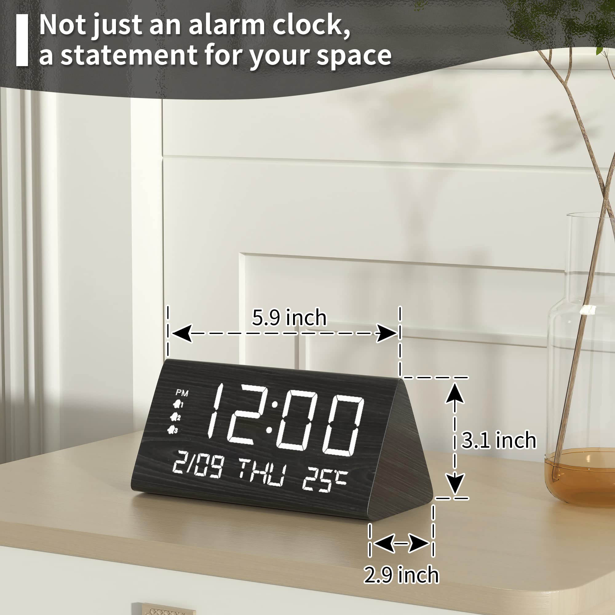 JALL clock held in hand for size scale, compact for small spaces