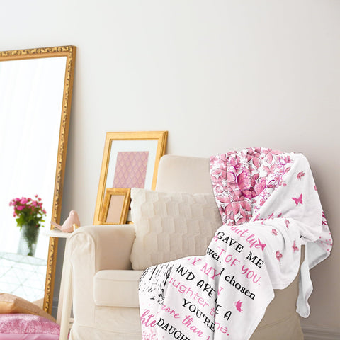 Jamfind blanket beside person to show 60x50 size and coverage
