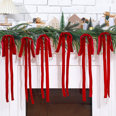 Janinka bow tied to staircase rail creating elegant holiday focal point