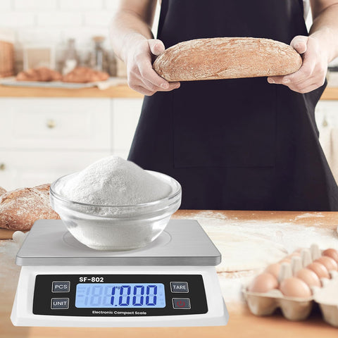 JAQAZNVB size comparison with rolling pin to illustrate compact footprint and 30kg capacity